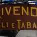 ...e quella originale che riporta addirittura lo stemma dei Savoia